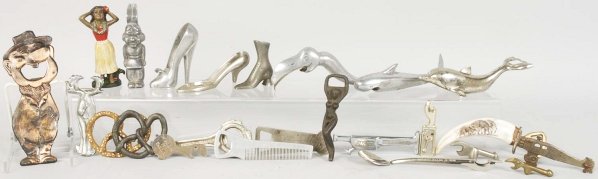 Lot of 24: Assorted Figural Bottle Openers.: Aluminum and cast iron. Condition (Very Good). Size Largest: 5 - 1/8" T.