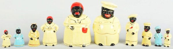 Lot of Black Americana Cookie Jars & Shakers.: Largest: 11" T. Includes modern Mammy and Cooky cookie jars along with four sets of vintage Peppy and Salty shakers. (Excellent).