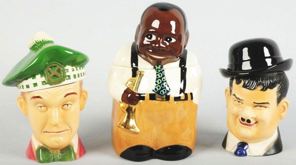 Lot of 3: Famous People Cookie Jars.: Largest: 11" T. This lot includes a B-Flat Williams by Alfano Art Pottery and an Oliver Hardy and Stan Laurel by Cumberland Ware. (Excellent).