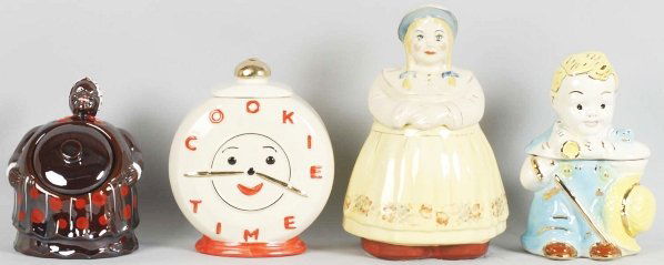 Lot of 4: Assorted Cookie Jars.: Largest: 11" T. Includes a Cookie Time by American Bisque and three others. (Excellent).