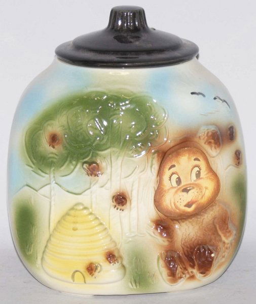 American Bisque Bear Flasher Cookie Jar.: 9 - 1/2" T. Black lid version. Jar has no chips or cracks and only minor crazing. Flasher face still intact. (Excellent).