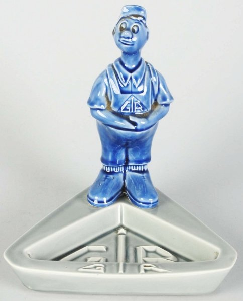 GR Man Advertising Ashtray.: 7 - 3/4" T. Features a man in blue standing on a gray ashtray advertising GR. (Excellent).