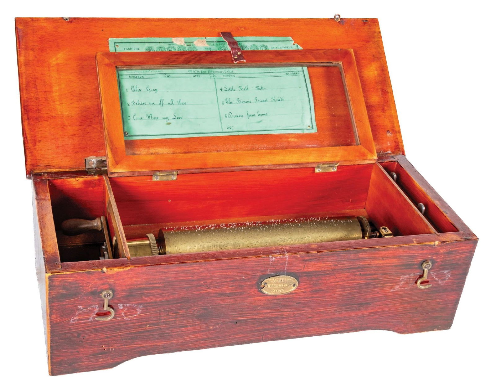 JEROME THIBOUVILLE-LAMY 6-TUNE CYLINDER MUSIC BOX: C. 1880. A very nice example of a Thibouville-Lamy 6-tune cylinder music box, playing an 8-1/2" cylinder in a mahogany cabinet and has the serial number 4196. CONDITION: It shows crank handle wind wit
