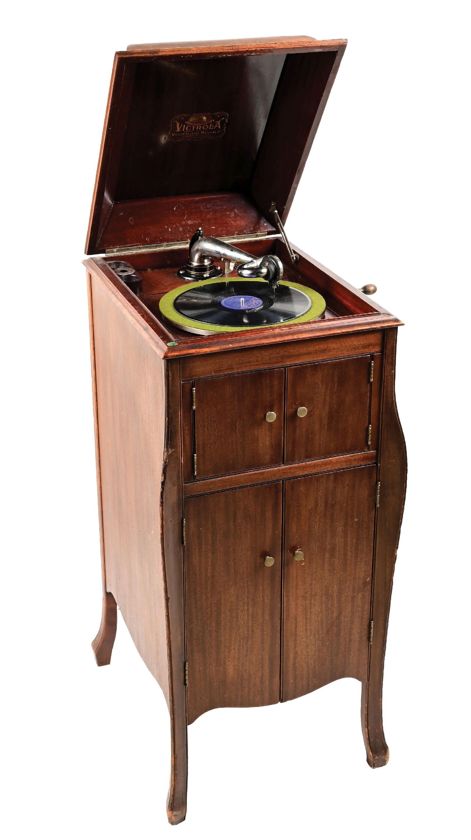 VICTROLA FLOOR MODEL RECORD PLAYER MODEL VV-X-186470J: C. 1940. CONDITION: An all original floor model of a Victrola record player in walnut cabinet. It shows original felt to the turntable, correct reproducer and correct crank. The case shows some areas