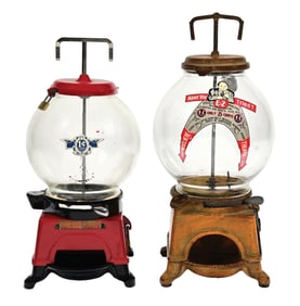 PAIR OF CAST IRON ADLEE VENDING MACHINES