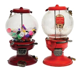 PAIR OF COLUMBUS CAST IRON VENDING MACHINES