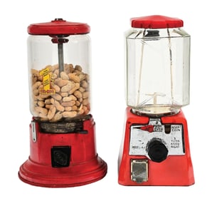 PAIR OF CAST IRON PEANUT VENDING MACHINES
