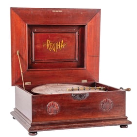 REGINA 20-1/2" DISC MUSIC BOX WITH 12 DISCS