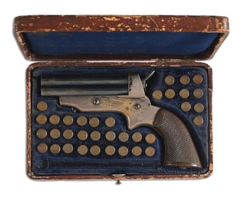(A) CASED SHARPS MODEL 2A FOUR BARREL DERRINGER.