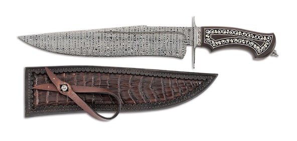 WAGNER FACTORE DAMASCUS BOWIE WITH ORNATE HANDLE.