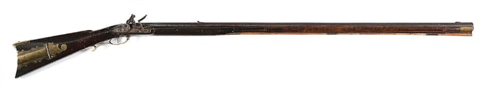 (A) INCISE CARVED FLINTLOCK KENTUCKY RIFLE ATTRIBUTED TO JOEL FEREE.