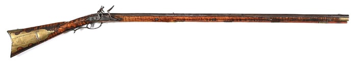 (A) RELIEF CARVED FLINTLOCK KENTUCKY RIFLE ATTRIBUTED TO GEORGE SCHROYER.