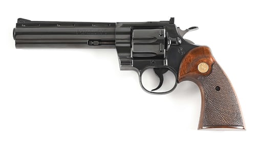 (C) COLT PYTHON .357 MAGNUM DOUBLE ACTION REVOLVER (1966).