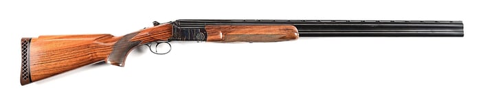 (C) PERAZZI SC1 12 GAUGE OVER UNDER TRAP SHOTGUN.