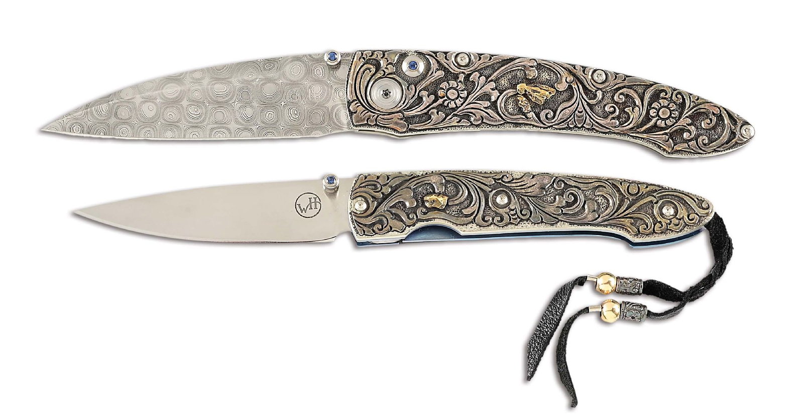 LOT OF 2: WILLIAM HENRY SILVER VINE FOLDERS WITH SAPPHIRE INLAYS.: Lot consists of: (A) William Henry silver vine button lock folding knife that features a "mosaic" Damascus blade with a sapphire thumbstud and button. Blade measures 3" with WH monogram. Textured silv