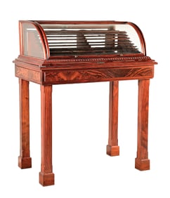 WINCHESTER CURVED GLASS COUNTERTOP DISPLAY WITH STAND.