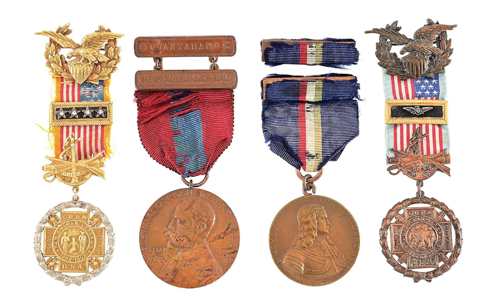 LOT OF 4: US SPANISH AMERICAN WAR AND MEXICAN BORDER MEDALS.: Lot consists of: (A) Spanish American War Veterans Medal issued ca. 1900-1935. Bronze medals layered in 14K gold. Engraved on back center bar "H.E. WILLIAMS / 4716 N.E. 21 PORTLAND, ORE". Ribbon exhib