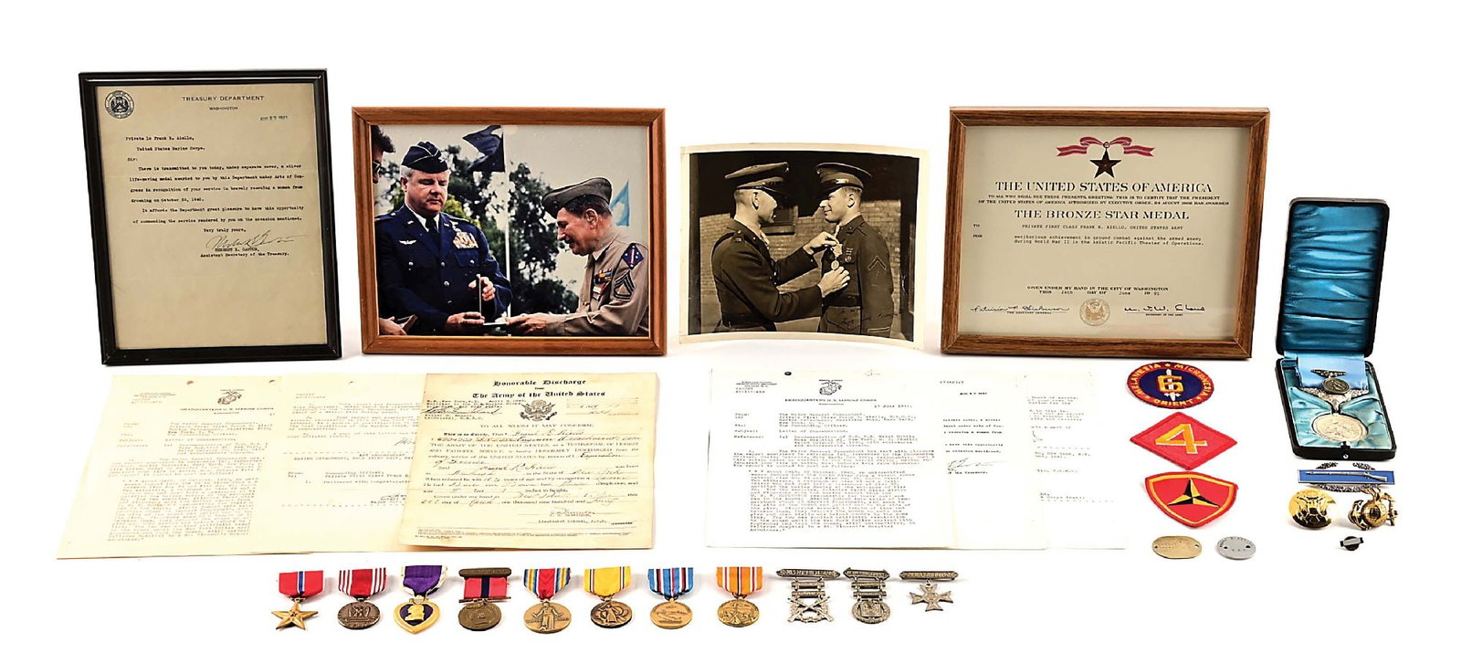 US WWII USMC SILVER LIFESAVING MEDAL GROUPING.: An excellent World War II era US Marine Corps Lifesaving Medal grouping consisting of the medal, citation, and the Marine's other service medals. The medal is engraved on reverse "TO / FRANK R. AIELLO