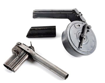 FIRST MODEL LUGER SNAIL DRUM MAGAZINE WITH UNLOADING TOOL.