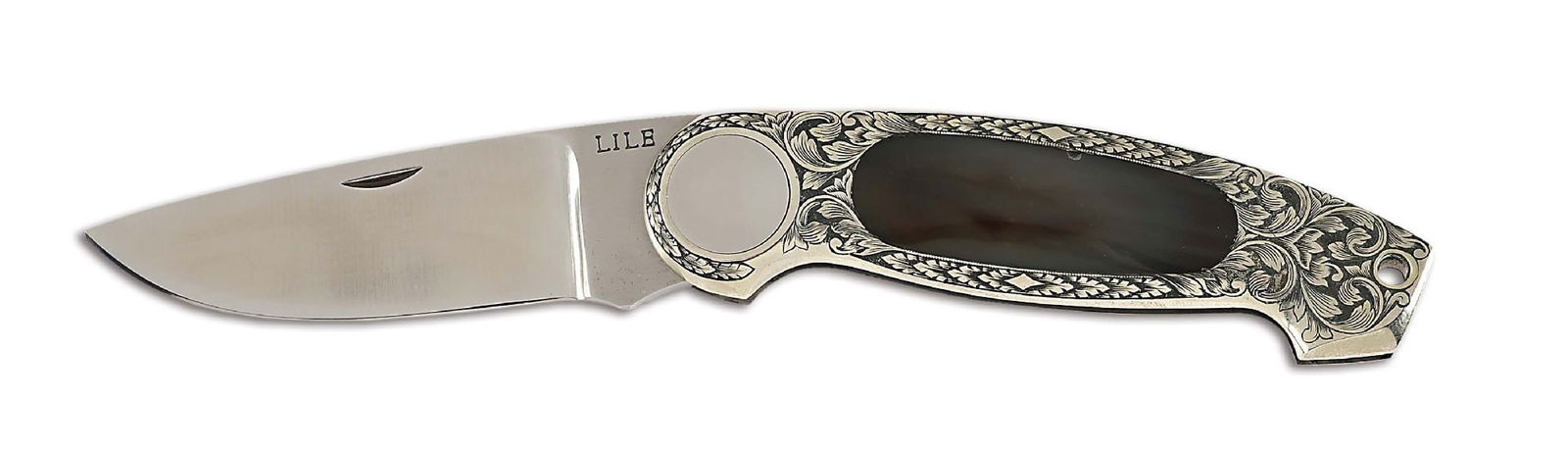JIMMY LILE CUSTOM FOLDER.: Jimmy Lile custom folder with a stainless steel blade marked "LILE" and numbered "135" on ricasso. The handle is silver with a heavy leaf engraving and a highly polished agate oval insert. Button is m