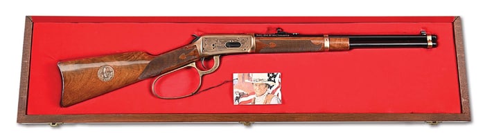 (M) COMMEMORATIVE JOHN WAYNE WINCHESTER MODEL 1894 LEVER ACTION CARBINE WITH WALNUT DISPLAY CASE