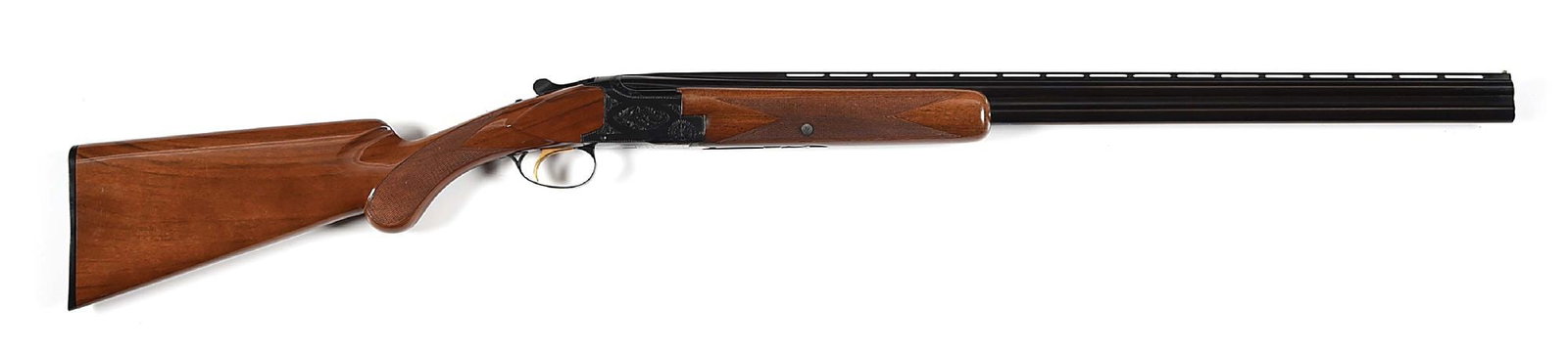 (C) BELGIAN BROWNING LIGHTNING 20 GAUGE OVER UNDER SHOTGUN.: Circa 1968 per serial number. Vent rib with brass bead front sight and machine cut matting, barrel legends for a Belgian manufactured 20 gauge with 3" barrels and Special Steel barrels. Matching seria