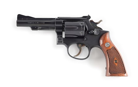 (C) SCARCE 4" SMITH & WESSON K-22 MASTERPIECE DOUBLE ACTION REVOLVER WITH GOLD BOX.