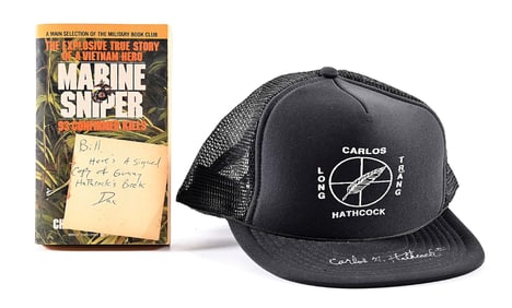 LOT OF 2: HAT AND BOOK SIGNED BY CARLOS HATHCOCK.