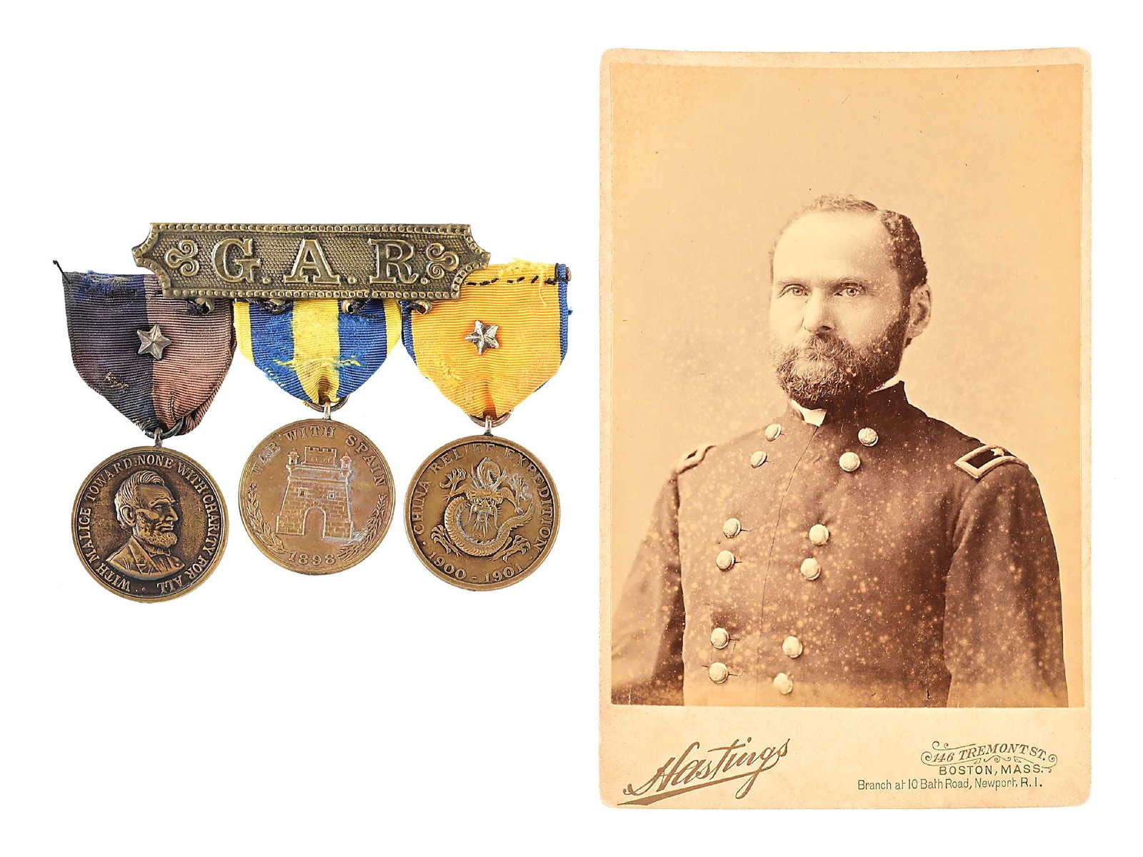 US CIVIL WAR GAR MEDALS OF AARON DAGGETT.: Group of three medals on GAR bar attributed to Union Brevet General Aaron Daggett. Includes Army Civil War Campaign Medal numbered "32" on the edge, Spanish Campaign Medal numbered "764" on the edge, 