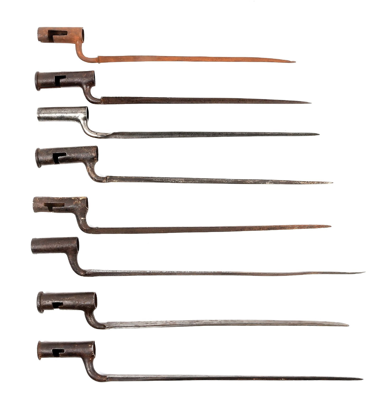 LOT OF 8: REVOLUTIONARY WAR AND CIVIL WAR ERA SOCKET BAYONETS.: Lot includes 4 British Brown Bess bayonets, one marked "HARVEY" and another one marked "WORSLEY". Two French bayonets and two later Civil War bayonets. CONDITION: All but one show heavy patina, pittin