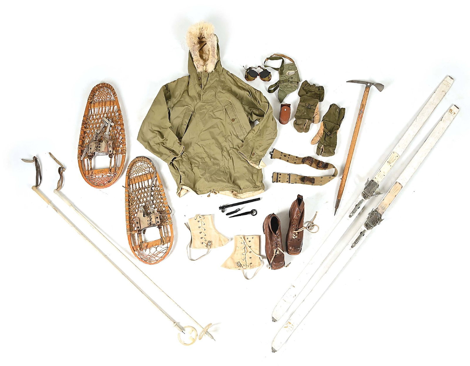 LOT OF US WWII 10TH MOUNTAIN DIVISION UNIFORM, GEAR, AND EQUIPMENT.: A nice offering of an incomplete loadout for a World War II US Army 10th Mountain Division soldier. The lot includes an M42 2nd Pattern reversible ski parka complete with its original spec. tag dated 