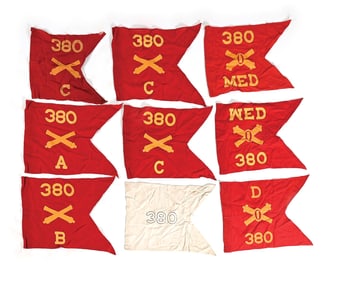 LOT OF 9: US 380TH ARTILLERY BATTALION GUIDON FLAGS.