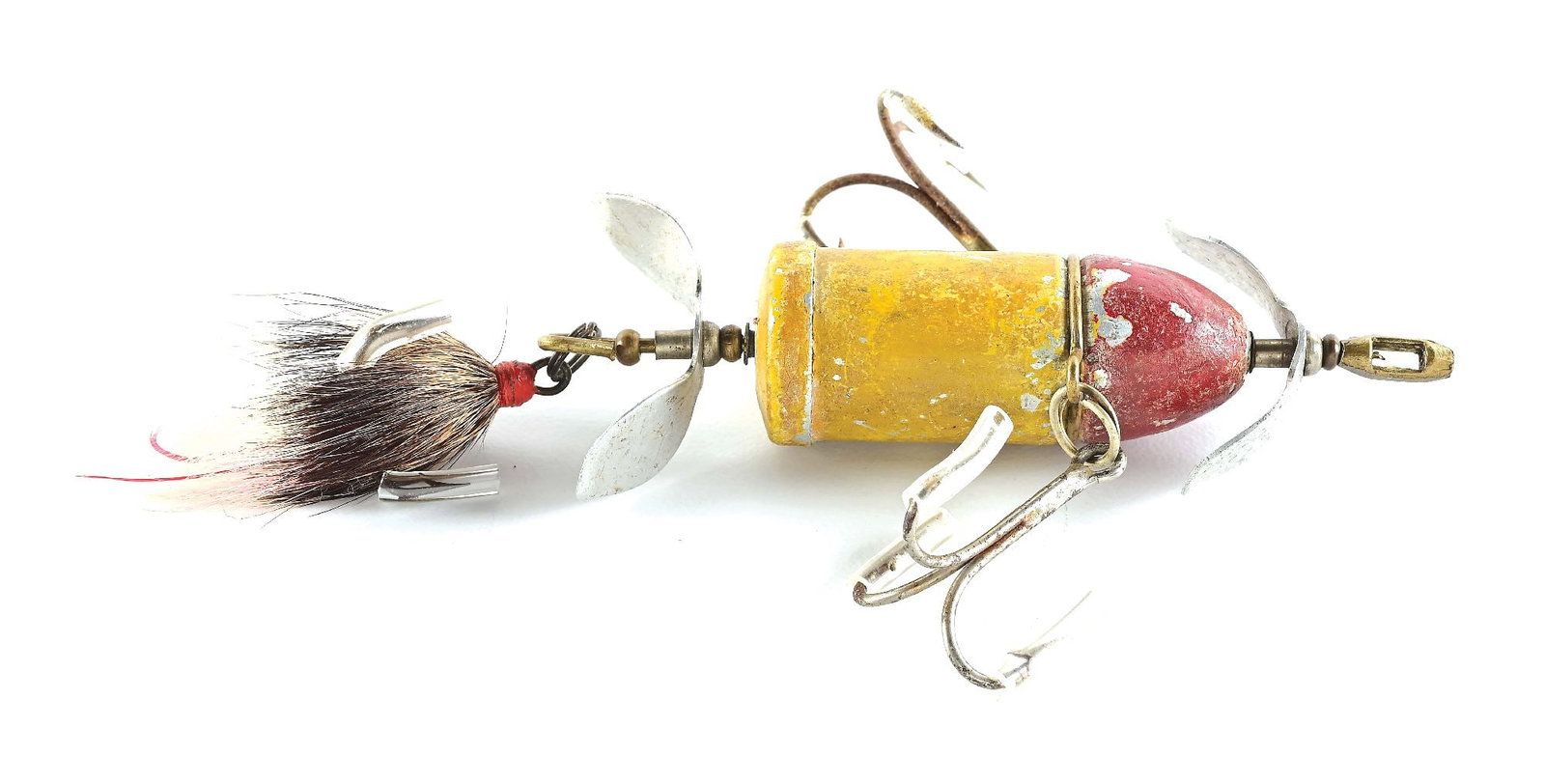 SHAKESPEARE PAINTED WORDEN BUCKTAIL REVOLUTION: Made starting in 1909, painted examples are much tougher than unpainted aluminum ones. This bait has a pair of pointed aluminum props, a full bucktail dressed rear treble (but not original), and repla