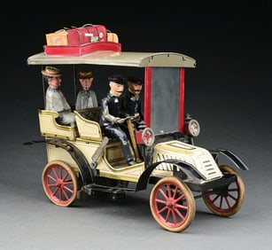 CARETTE TIN LITHO CLOSED 4-SEAT CAR W/ HAND-PAINTED FIGURES