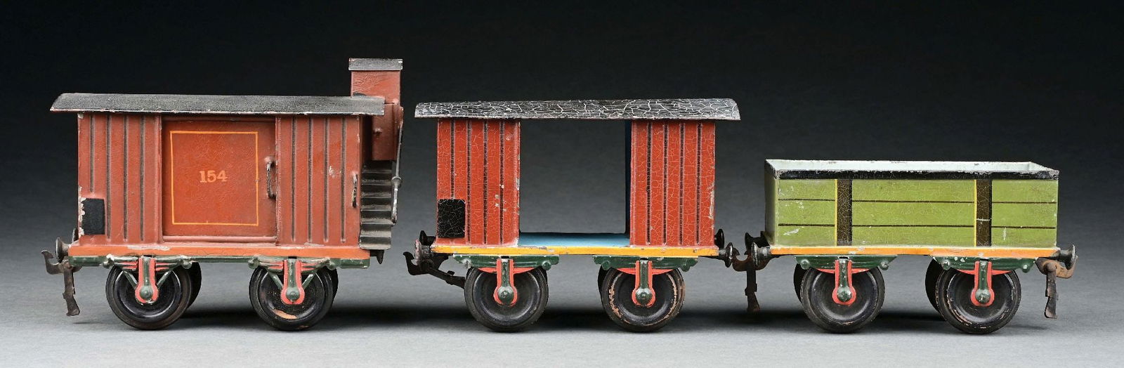 LOT OF 3: MARKLIN HAND-PAINTED II GA. 4-WHEEL FREIGHT CARS: CONDITION: All cars have replacement wheels. Item Dimensions: Largest: 7" x 3" x 5 - 1/2".