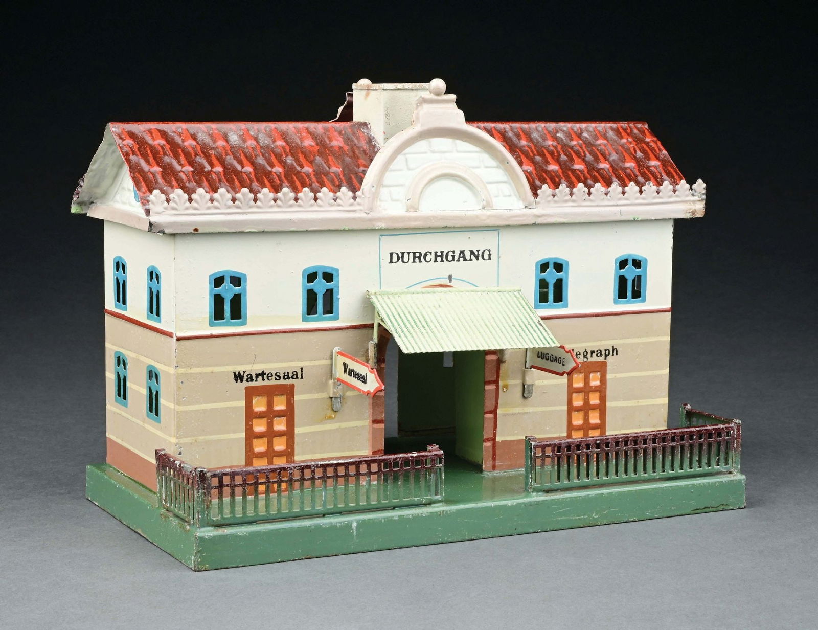 MARKLIN HAND-PAINTED RAILROAD STATION: C. 1912-1914. CONDITION: Near mint. Item Dimensions: 11" x 5 - 3/4" x 7 - 3/4".