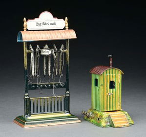 LOT OF 2: MARKLIN HAND-PAINTED DESTINATION BOARD & ELECTIC LIT GUARDHOUSE