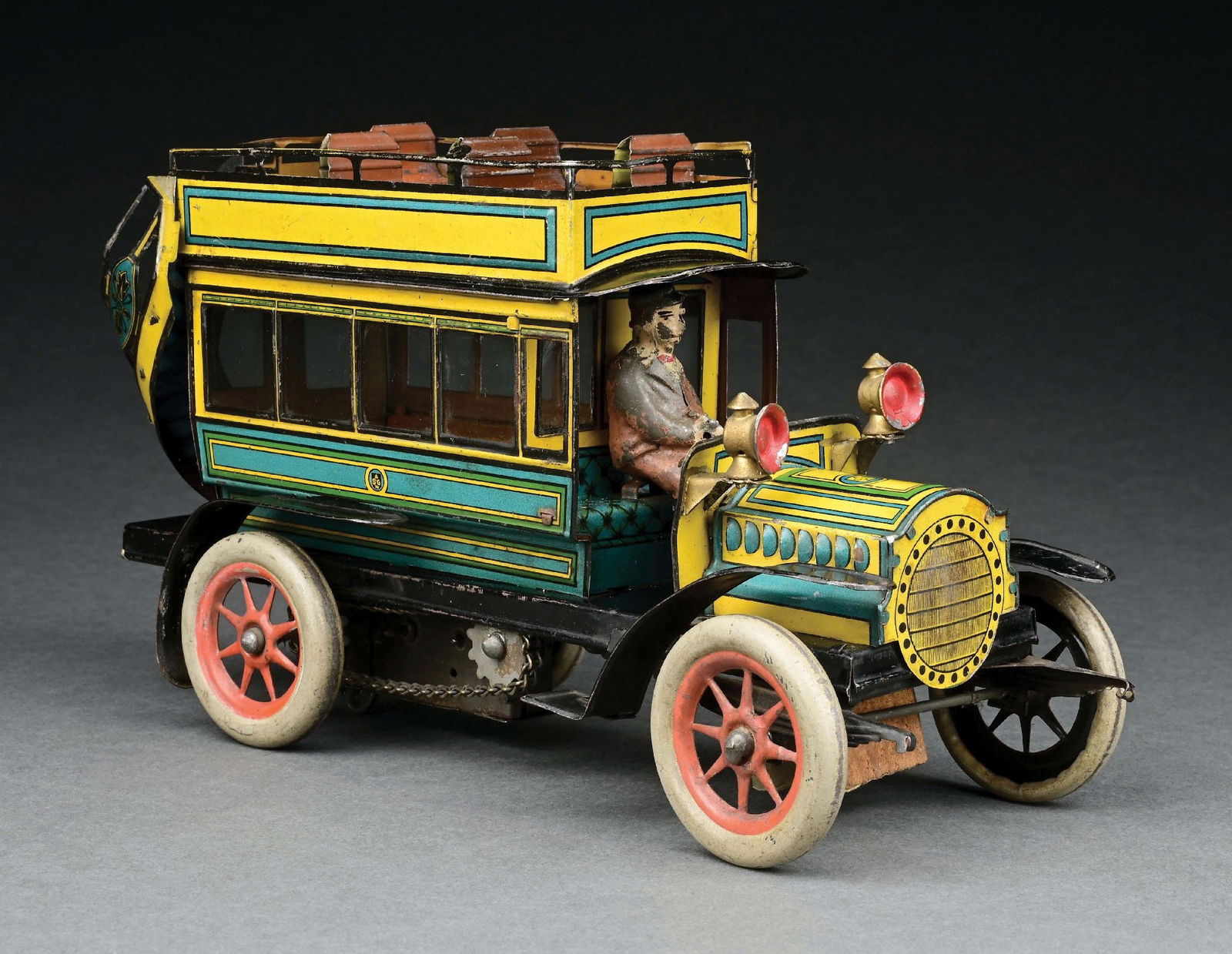 GUNTHERMANN TIN LITHO DOUBLE-DECKER BUS: CONDITION: Retains original headlights and driver. Interesting feature of clockwork billow. Excellent condition, could possibly clean to a better grade. Wear to figure. Item Dimensions: 10 - 1/2" x 4"