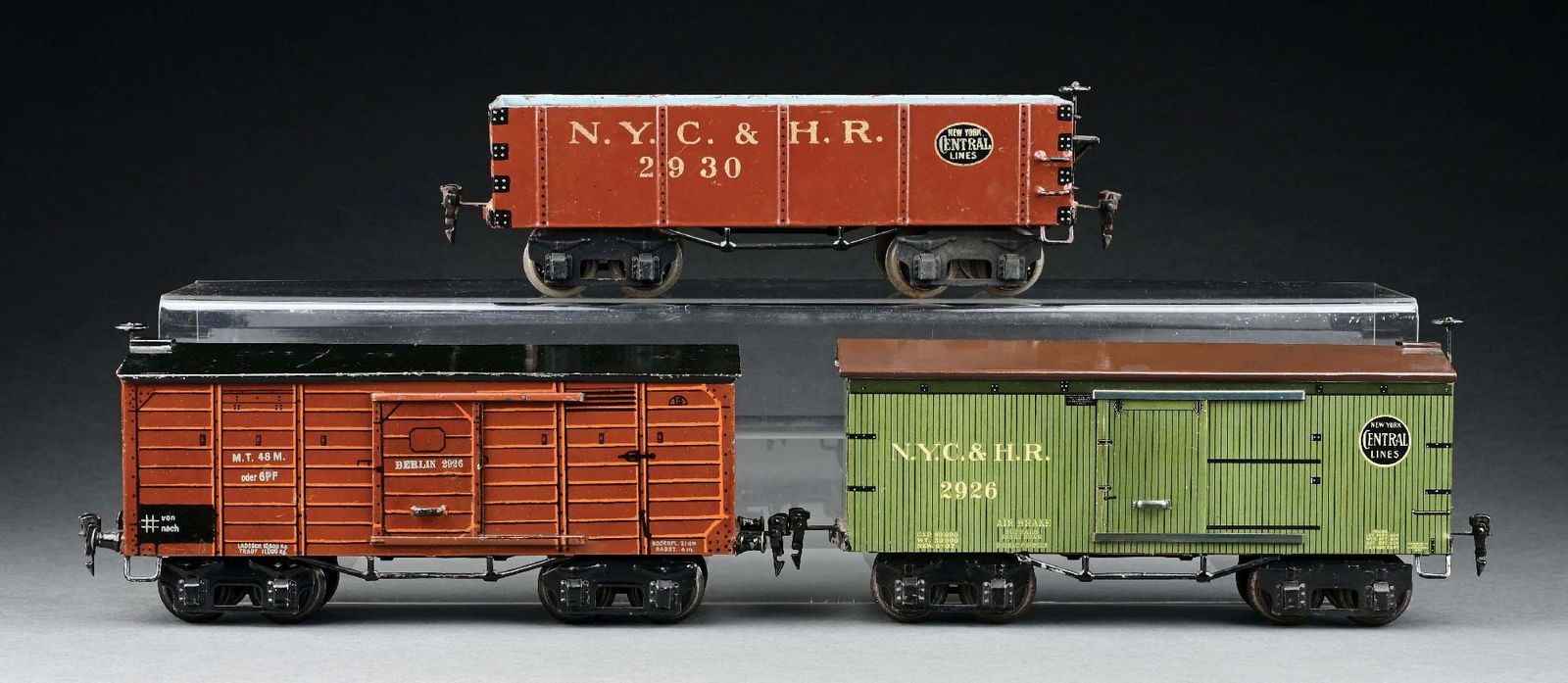 LOT OF 3: MARKLIN I GA. FREIGHT CARS: Two for the American market lettered N. Y. C. & H. R., the other for German market. CONDITION: Near mint condition. Item Dimensions: Each approx: 11 - 1/2" x 3" x 5 - 1/2".