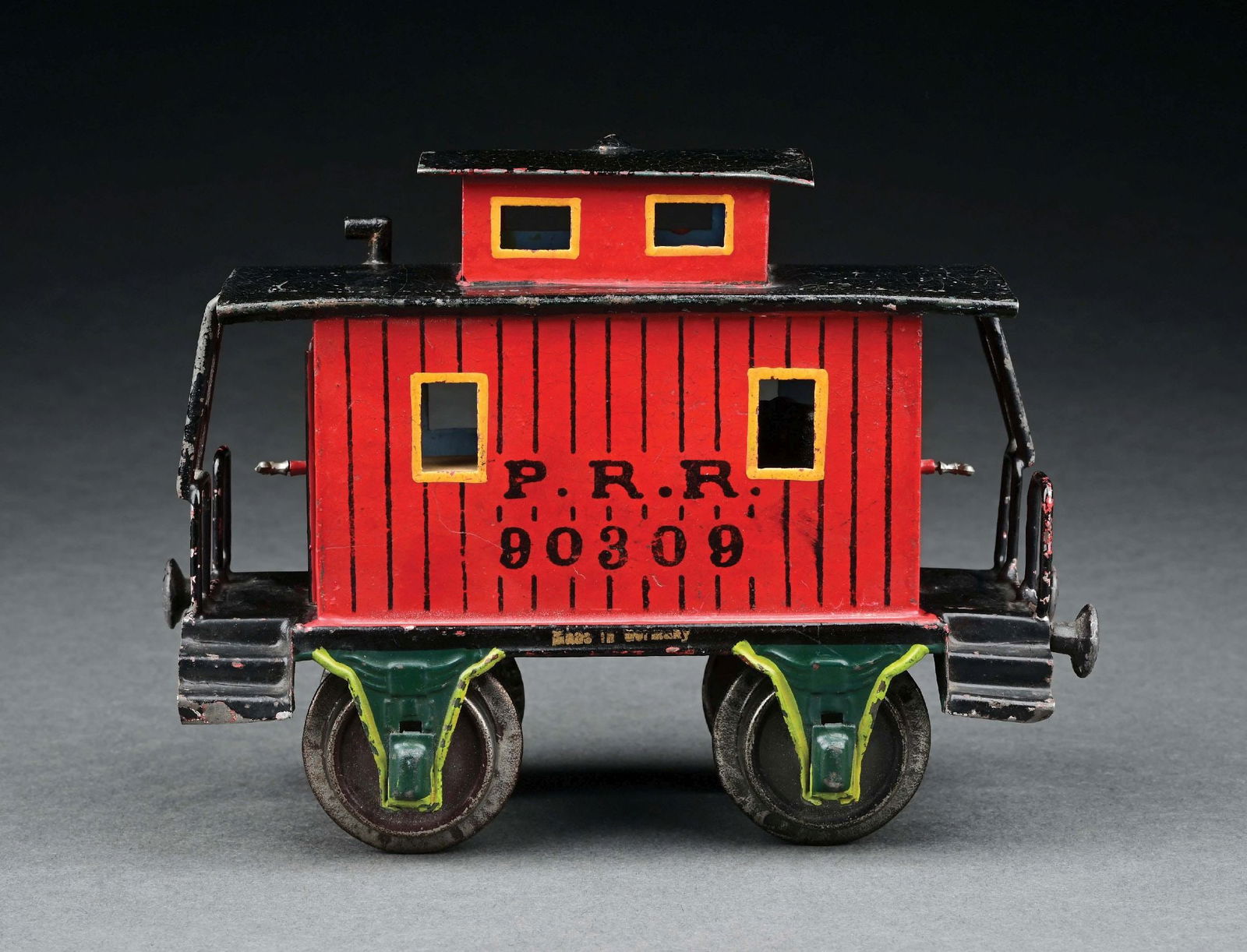 MARKLIN PRR 4-WHEEL RED CABOOSE: C. 1905-1908. Original stove. CONDITION: Excellent. Item Dimensions: 6 - 1/4" x 3" x 5".