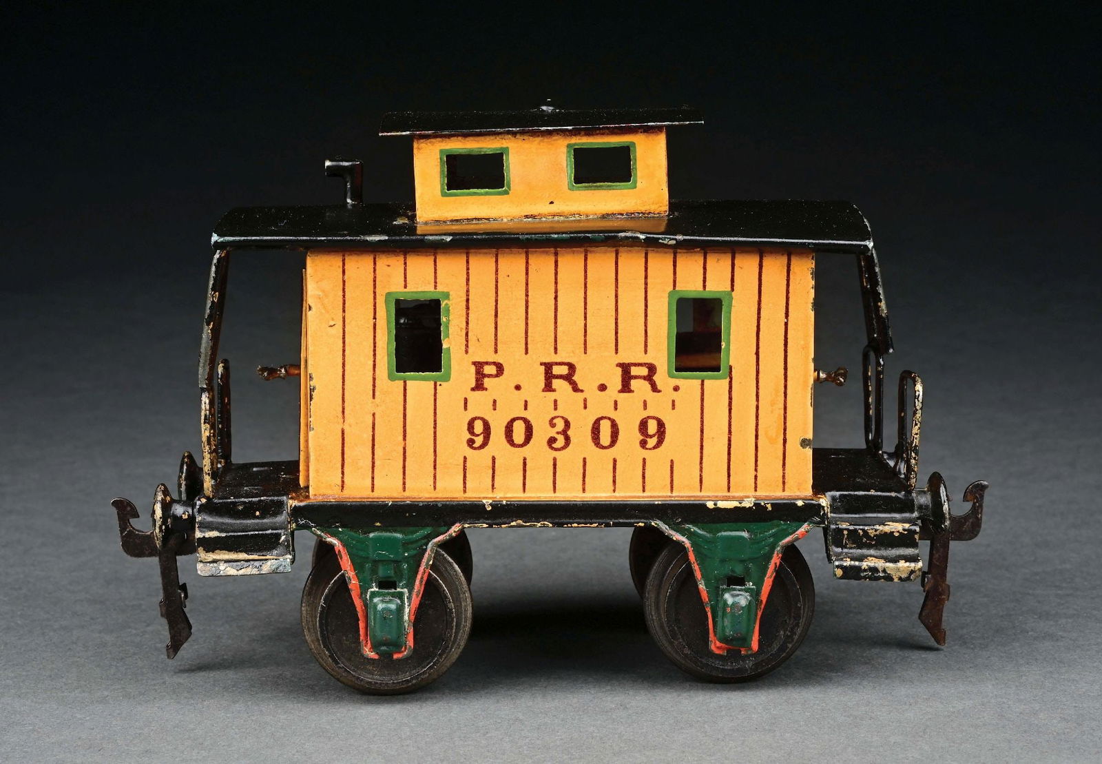MARKLIN HAND-PAINTED YELLOW PRR CABOOSE: C. 1904-1905. CONDITION: Yellow parts of cupola expertly repainted. Item Dimensions: 7" x 2 - 1/2" x 4 - 1/2".