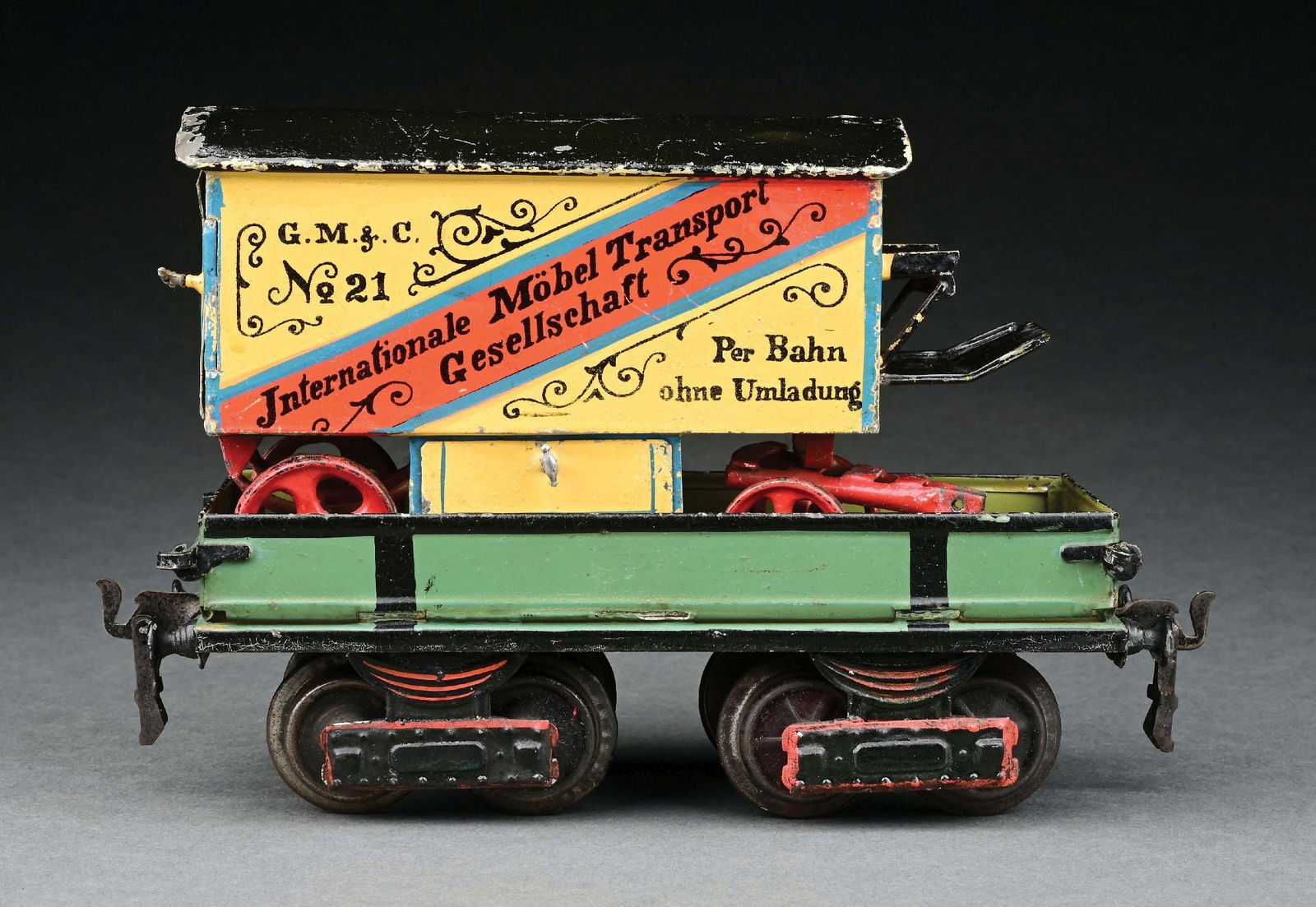 MARKLIN I GA. HAND-PAINTED FURNITURE CAR: With original scarce yoke. CONDITION: Excellent condition. Item Dimensions: Largest: 9 - 3/4" x 3" x 2 - 3/4".