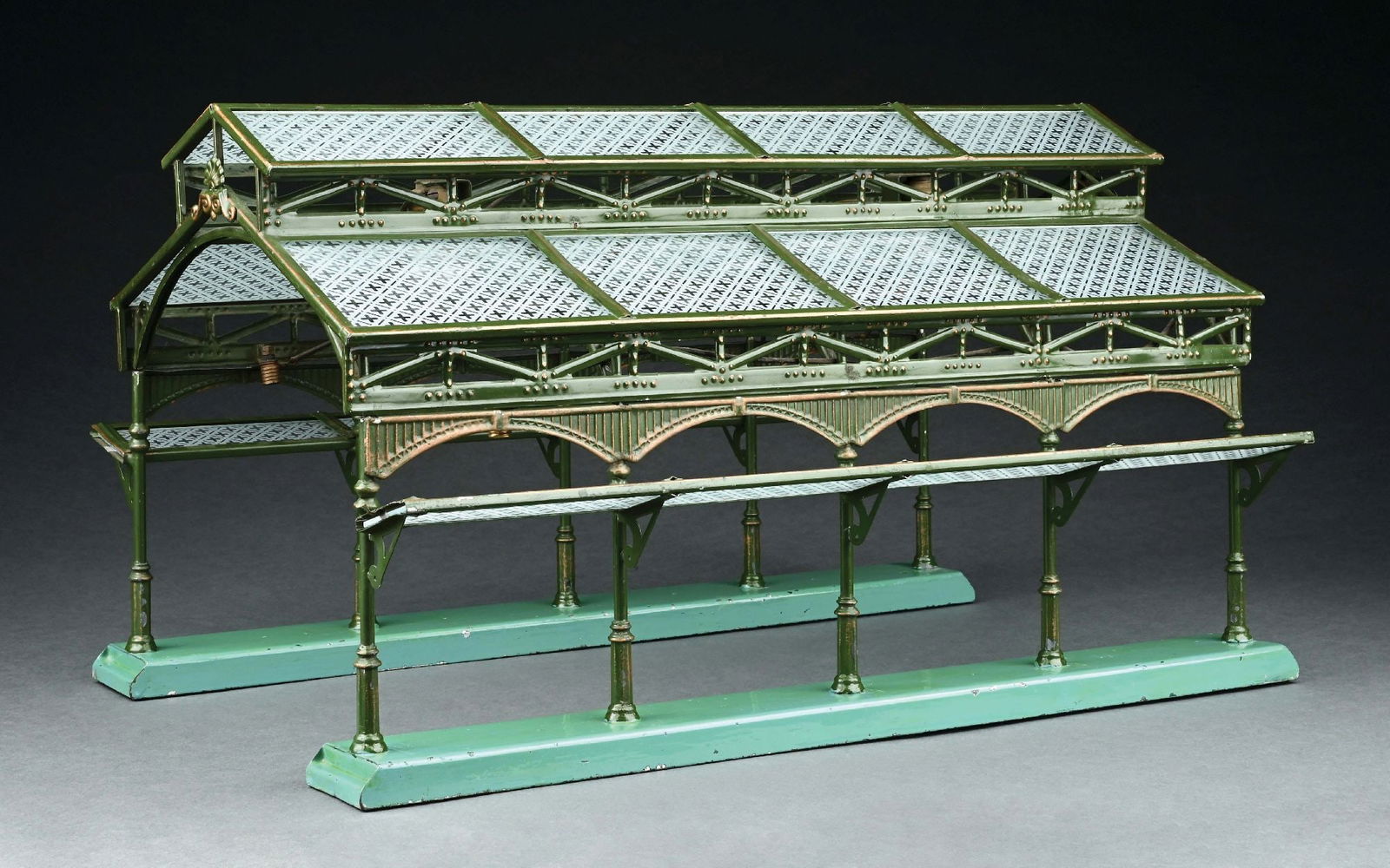 MARKLIN GAUGE O GLASS STATION HALL: Electric lighted version. CONDITION: Missing 3 post attachments otherwise near mint condition. Item Dimensions: 20 - 1/4" x 11 - 1/2" x 12".