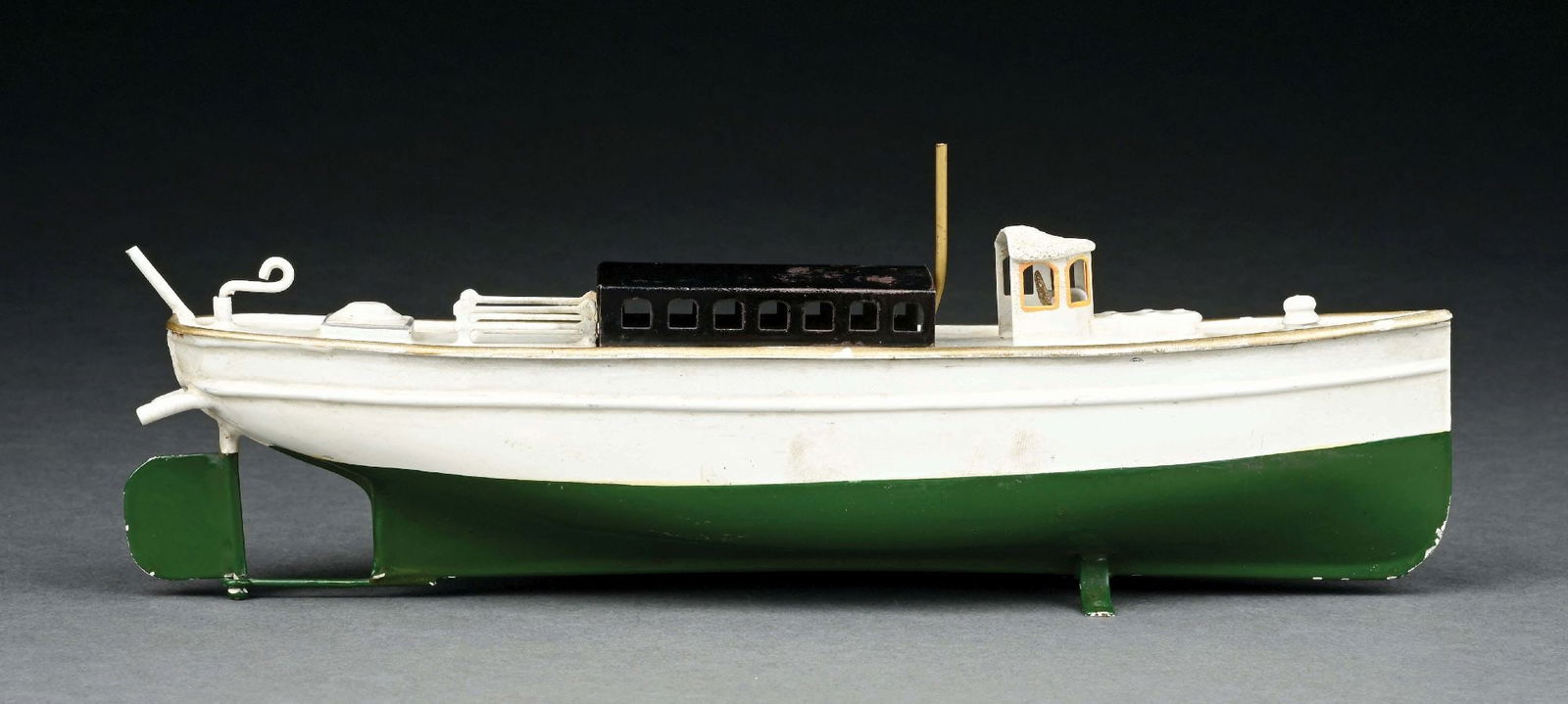 MARKLIN SMALL SIZE PUTT-PUTT POWERED BOAT: CONDITION: Near mint. Item Dimensions: 9" x 2 1/2" x 2 1/2".
