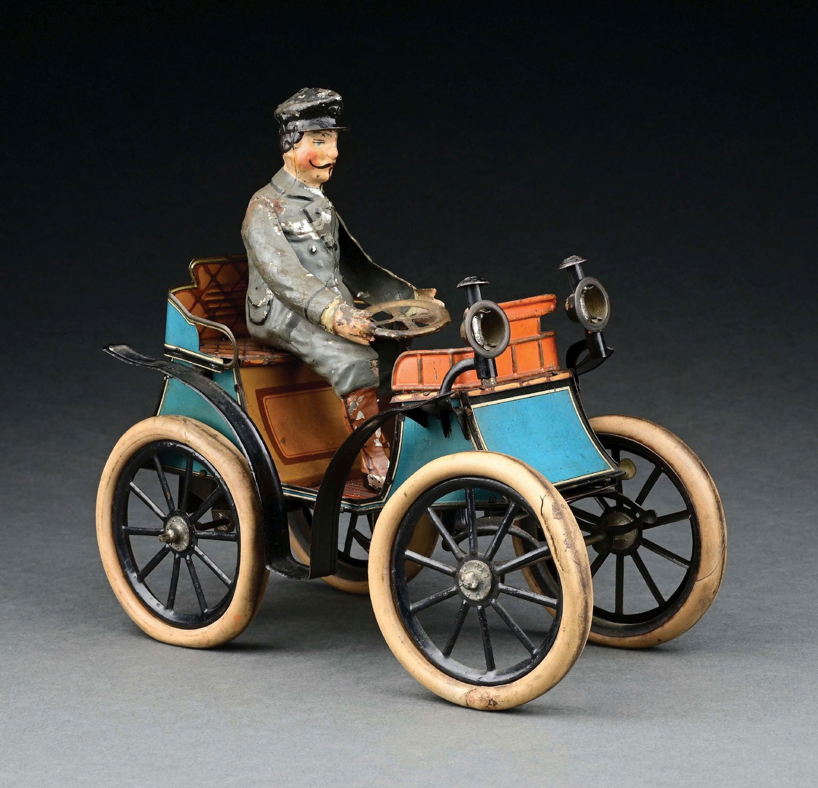 GUNTHERMANN TIN LITHO VIS-A-VIS W/ HAND-PAINTED DRIVER: CONDITION: Driver is in very good to excellent original condition, the rest of the car is excellent condition. Item Dimensions: 9 - 1/2" x 4 - 1/2" x 8 - 1/2".