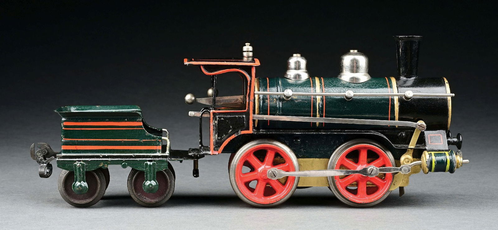 MARKLIN 0-4-0 CLOCKWORK LOCOMOTIVE & TENDER: C. 1900. CONDITION: Near mint. Item Dimensions: Engine: 8 - 1/4" x 3" x 5".