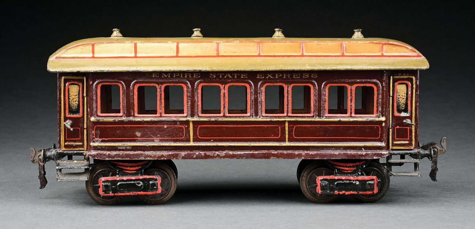 MARKLIN I GA. EMPIRE STATE EXPRESS COACH: C. 1905. CONDITION: Very good all original condition. Item Dimensions: 12 - 1/4" x 3 - 1/2" x 5 - 1/2".