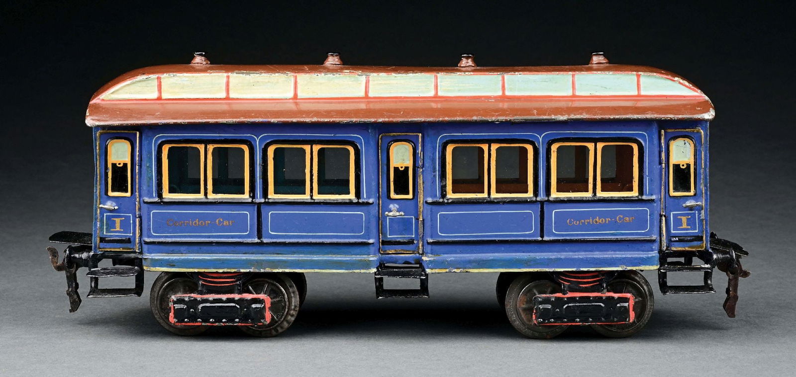 MARKLIN I GA. CENTER DOOR CORRIDOR CAR: Scarce for British for American market lettering. CONDITION: Minor touch-up, overall appearance excellent. Item Dimensions: 13" x 3 - 1/2" x 5 - 1/2".