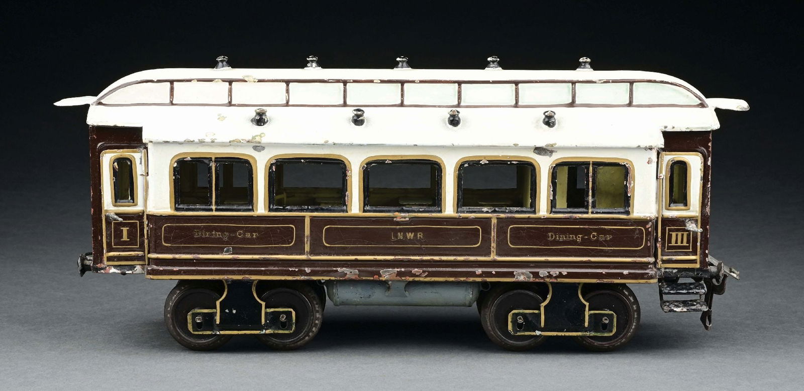 MARKLIN II GA. HAND-PAINTED LNWR DINING CAR: CONDITION: Missing one step, otherwise excellent condition. Item Dimensions: 15 - 1/2" x 4" x 6".