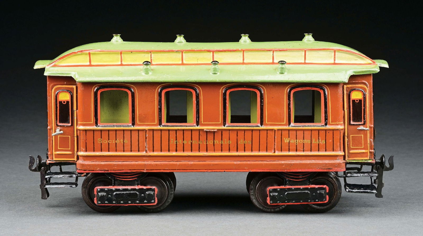 MARKLIN I GA. HAND-PAINTED SLEEPING CAR WITH FRENCH INSCRIPTIONS: C. 1904-1906. Inscribed "Societe Interionale des Wagons Lits." CONDITION: Overall appearance is near mint, but has a few touch-ups, making the grade excellent. Item Dimensions: 12" x 3 - 1/2" x 5 - 1/